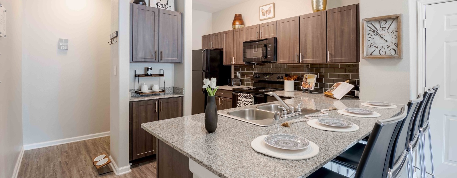 kitchen with island and barstools