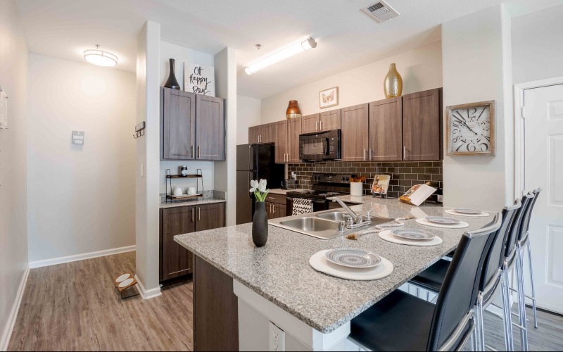kitchen with and island and barstools