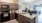 kitchen with barstools and island